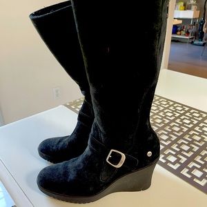 Black wedged fur-lined UGG boots